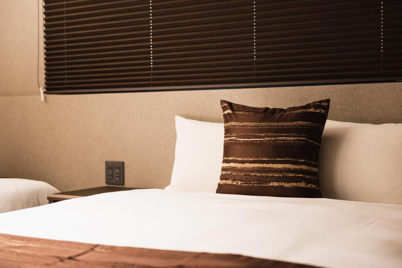 Grand Base Beppu Ekihigashi Lejlighedshotel Eksteriør billede